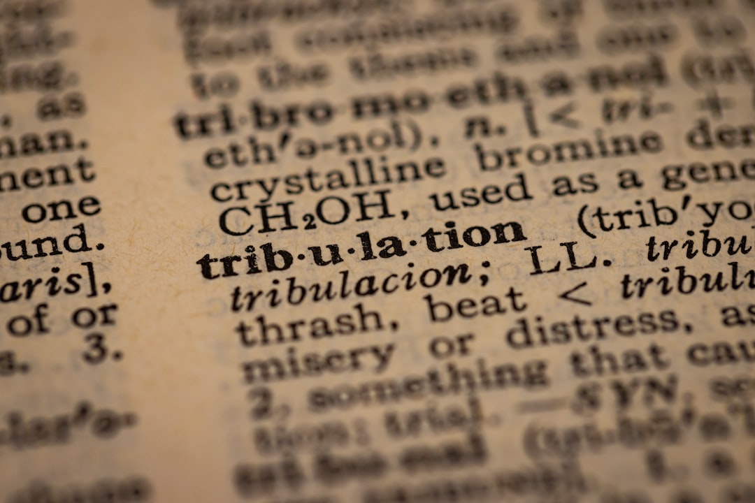 a close up of a book with words in it